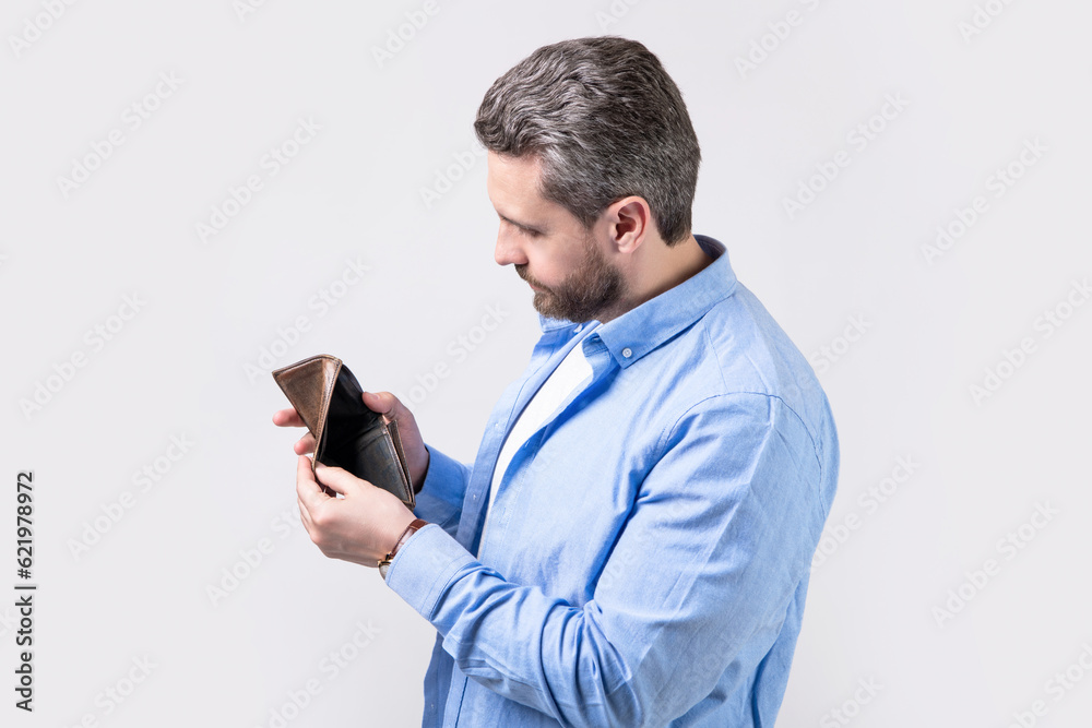 poor bankrupt man with wallet isolated on studio background. bankrupt man poor bankrupt man with wallet isolated on studio background. bankrupt man