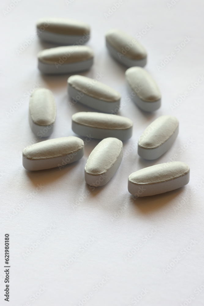 Detail of blue pills in packaging and isolated