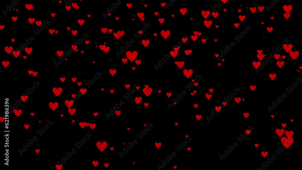 Red hearts fall from top to bottom on a black background Red hearts fall from top to bottom on a black background