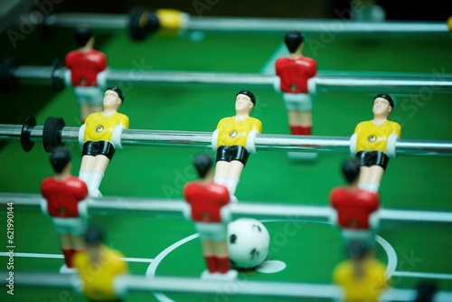 Fototapeta Naklejka Na Ścianę i Meble -  A board game of football. A miniature field. A game for two.