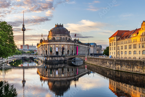 The Bode Museum on Museum Island and the Monbijou bridge. Historic listed buildings next to Spree River, Mitte, Berlin. photo
