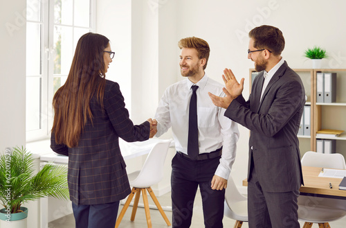 Obraz na plátne Successful business people meet, make a deal, and exchange handshakes