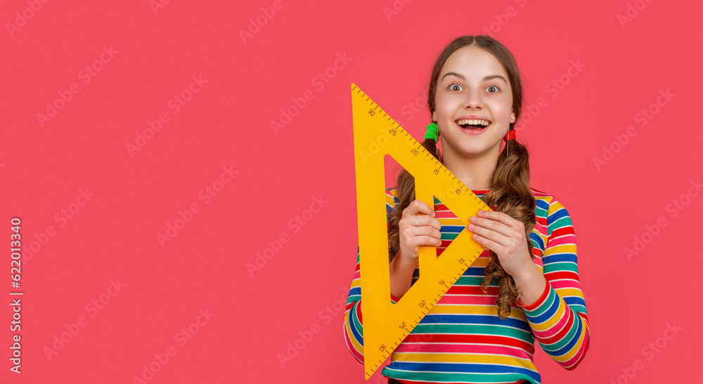 amazed school child hold math tool of triangle amazed school child hold math tool of triangle