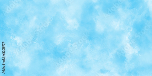 blue sky with clouds. Light sky blue shades watercolor background.Grunge blue background with space for text,watercolor abstract painting of blue grunge texture.	