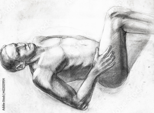 study hand-drawn drawing of nude man lying down drawn with charcoal on white paper