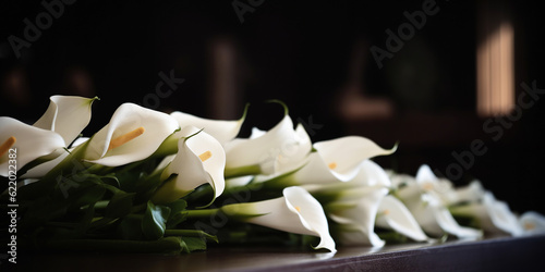 Generative AI, white flowers on the lid of the coffin, ceremony, funeral, ritual, farewell to the deceased, black background, calla lilies, floristic composition, funeral service