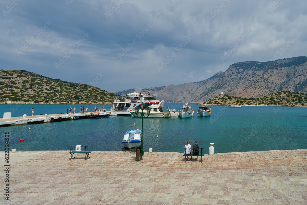 Symi Island, Greece in the foreground a fishing boat