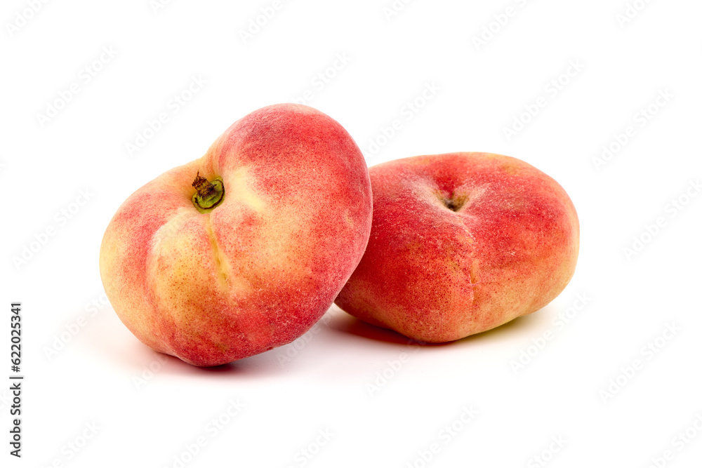 Flat Peaches, ripe nectarines, isolated on white background. Flat Peaches, ripe nectarines, isolated on white background.