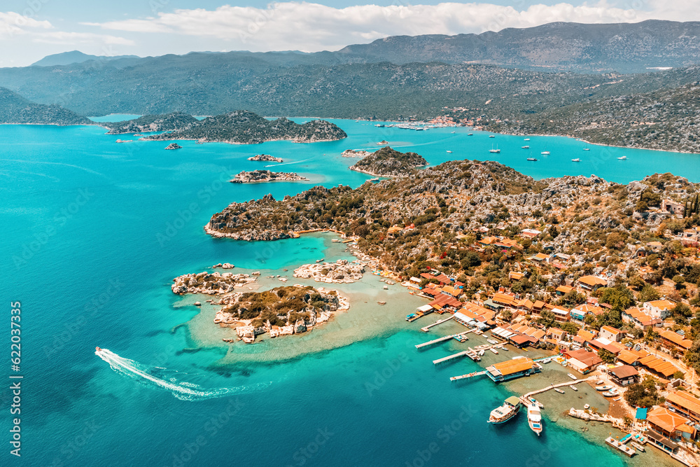 Naklejka premium Aerial view of Simena castle and fishing and tourist village Kaleucagiz and Kekova sunken city. Tourist and travel destinations in Turkey