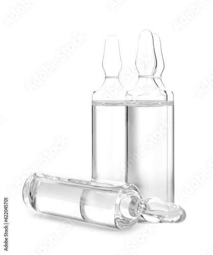 Medical ampules on white ba...