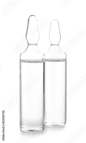 Medical ampules on white ba...