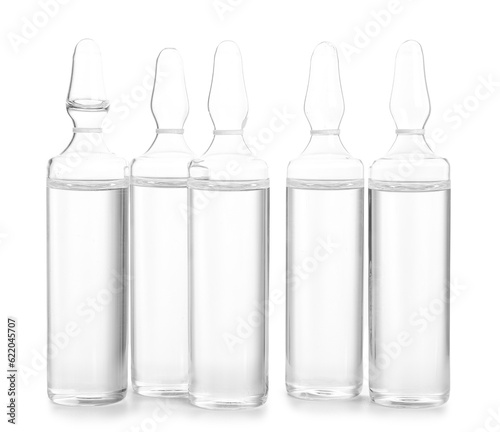 Medical ampules on white ba...