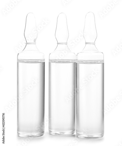 Medical ampules on white ba...