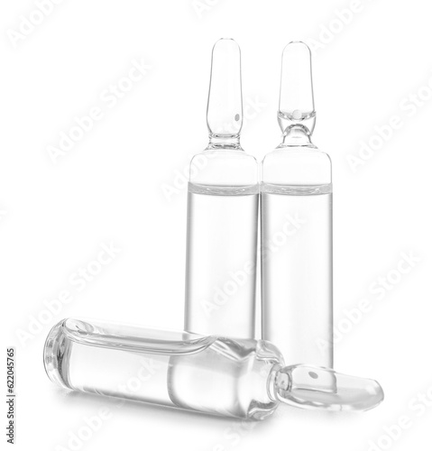 Medical ampules on white ba...