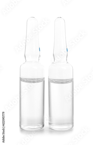 Medical ampules on white ba...