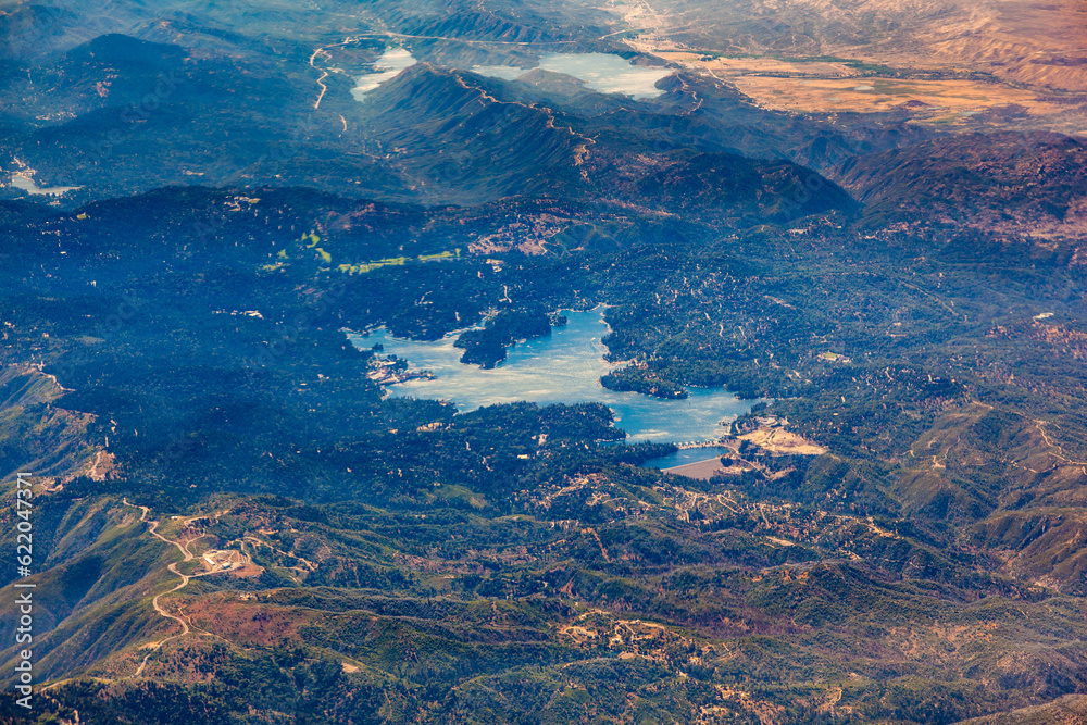 Aerial view of lake Arrowhead in California, the USA. Blue pond is in the mountain forests of San Bernardino County