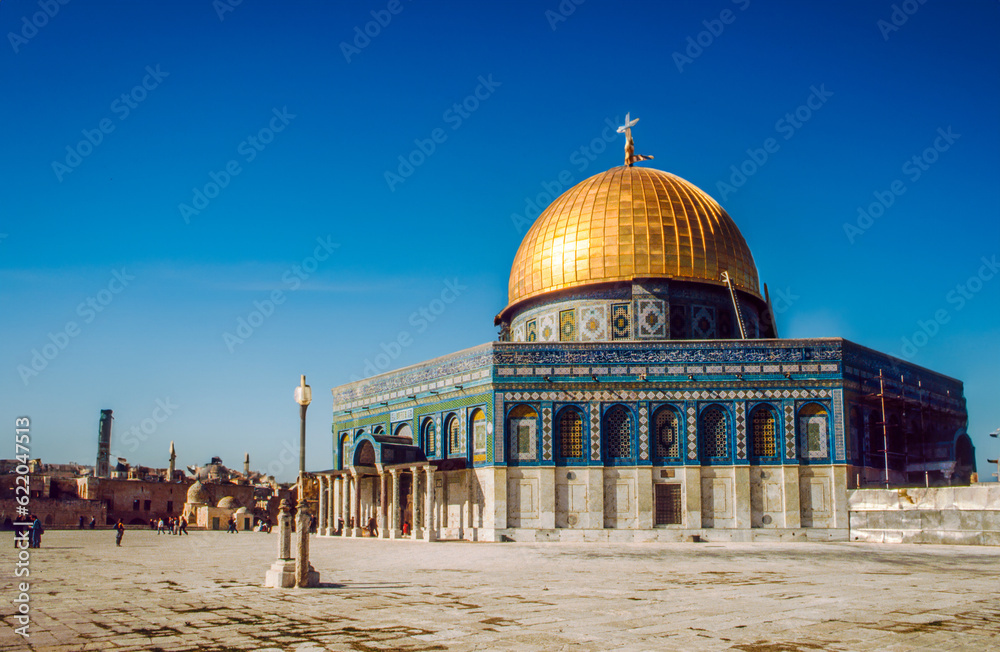 The afternoon sun shines on the golden Dome of the al Aqsa Mosqu
