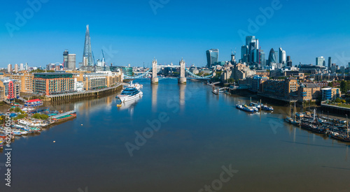 Aerial view of the Tower Bridge in London. One of London's most famous bridges and must-see landmarks in London. Beautiful panorama of London Tower Bridge. © Aerial Film Studio