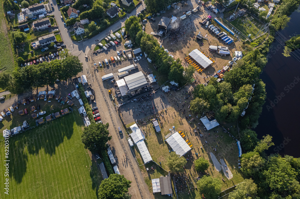 Fototapeta premium Aerial view of a rock festival in the village