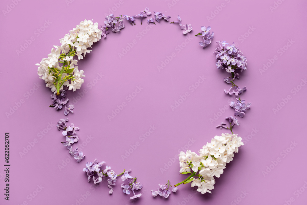 Frame made of different beautiful lilac flowers on pink background Frame made of different beautiful lilac flowers on pink background