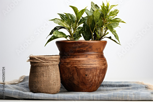 Image of an old burlap fabric pot or sackcloth isolated on a white background  providing a rustic and textured element. Generative Ai.