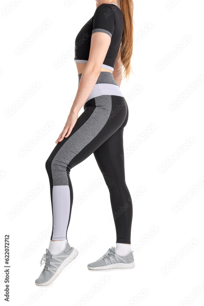 Young woman in sportswear on white background Young woman in sportswear on white background
