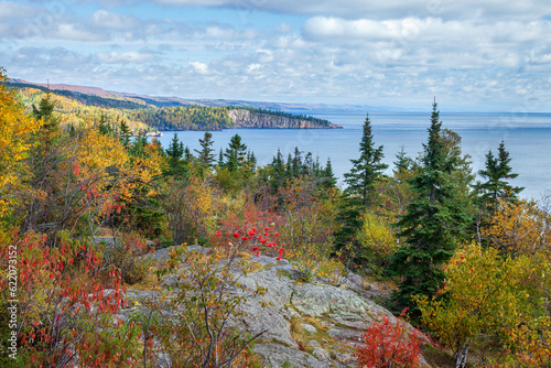 Cliffs and trees in fall color along Lake Superior in the fall