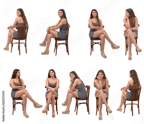 Foto various poses of the same girl sitting cross-legged and dressed in a dress on w