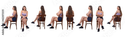 various poses of the same young woman with legs crossed dressed in sportswear on white background © curto