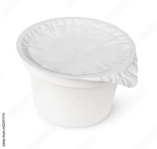 Plastic container for dairy foods with foil lid isolated on white background with clipping path