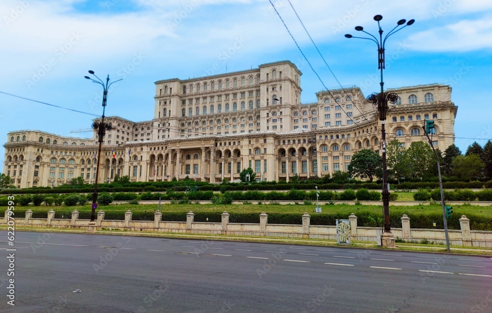 Naklejka premium The Palace of the Parliament, also known as the Republic's House or People's House, is the seat of the Parliament of Romania, located atop Dealul Spirii in Bucharest,