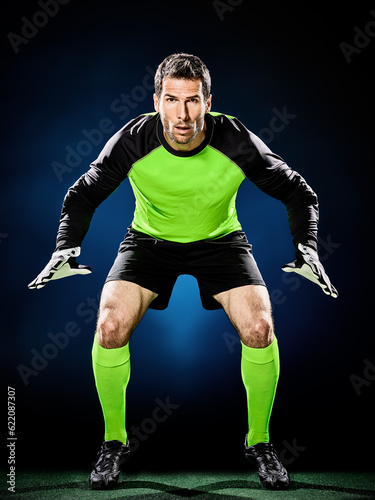 one caucasian goalkeeper soccer man isolated on black background