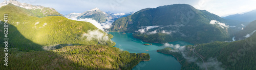 Slika na platnu Rugged, forest-covered landscape surrounds Diablo Lake in North Cascades National Park