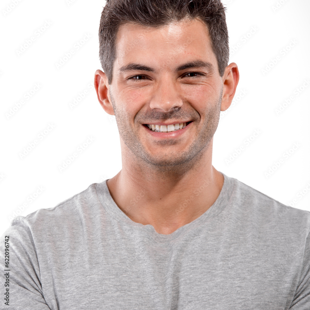 Fototapeta premium Portrait of a handsome latin man smiling, isolated over a white background