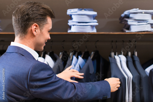 Young businessman in store