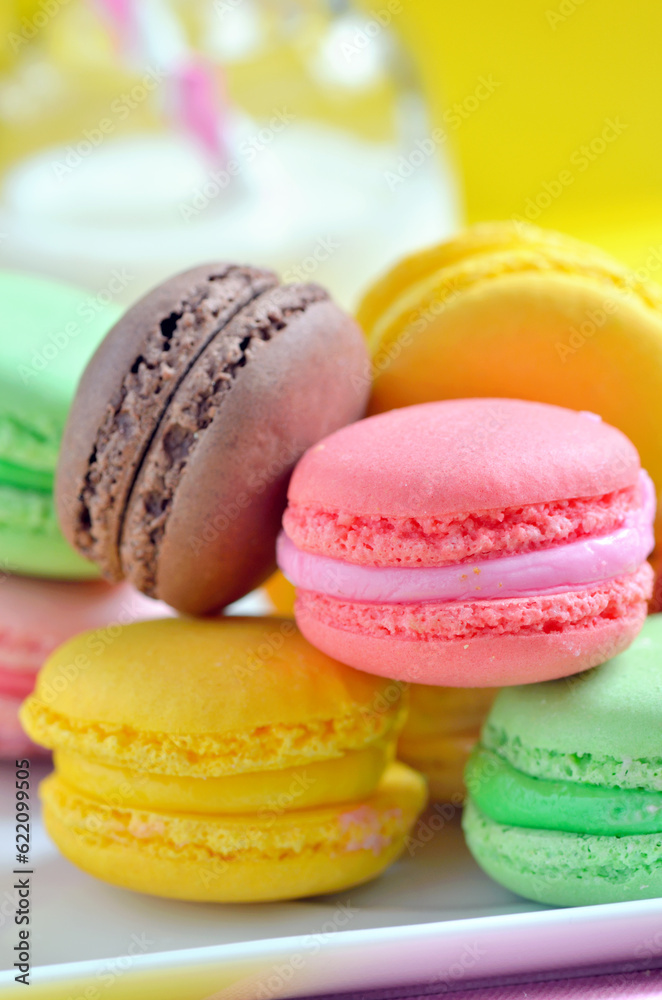 French colorful macarons on plate French colorful macarons on plate