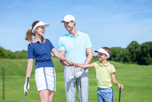 Family with child on a golf course