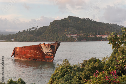 Photography A wreaked ship inside the bay of Baracoa, Cuba during the sunset