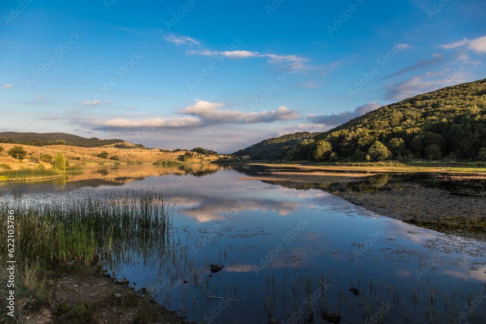 Landscape of Biviere lake with views of Etna, Nebrodi mountains, Messina, Sicily