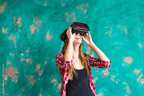 Woman in virtual reality headset enjoying her experience.
