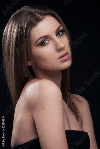 Beautiful woman on black background,Fashion portrait.Headshot.Classic portrait