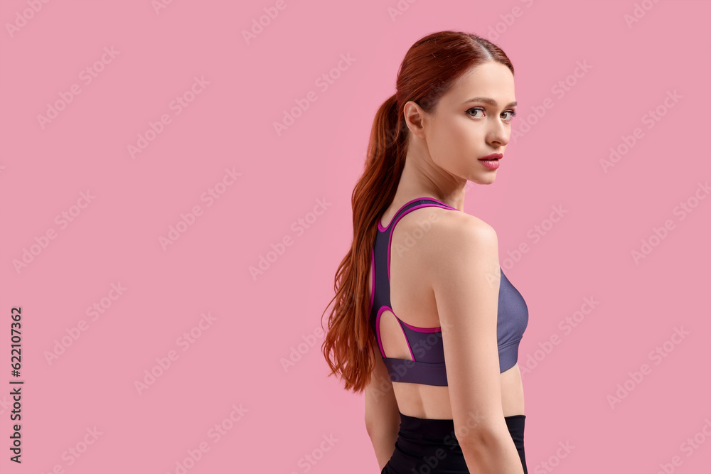 Young woman in sportswear on pink background, space for text Young woman in sportswear on pink background, space for text