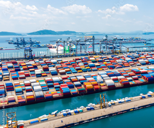 a wide and high angle view of sea port with many container, busy port
