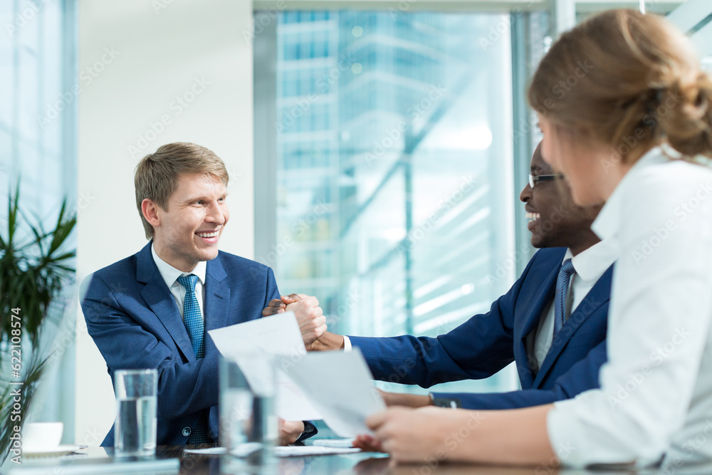 Smiling businessmen in office Smiling businessmen in office