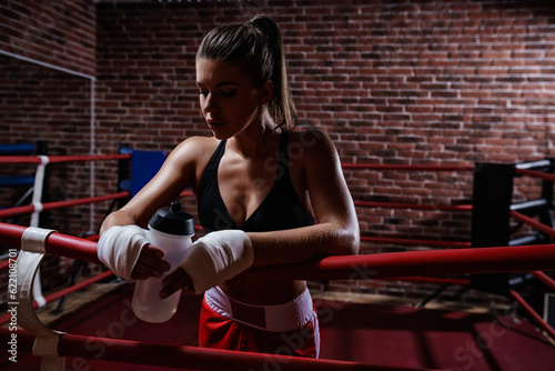 Young woman in boxing ring