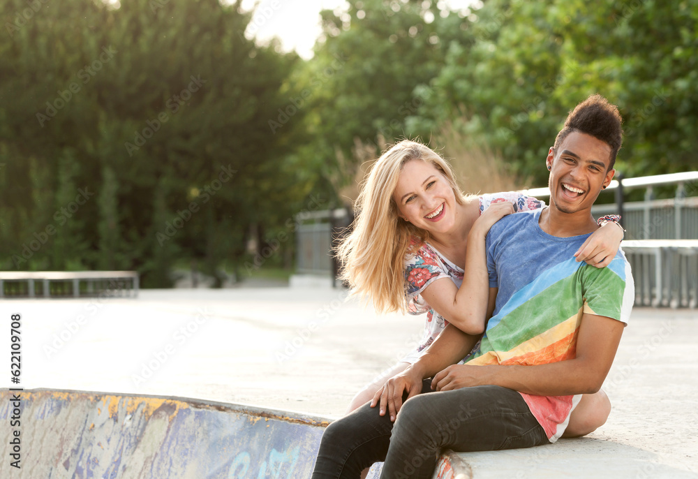 Happy and joyful people hanging around in a skate park.