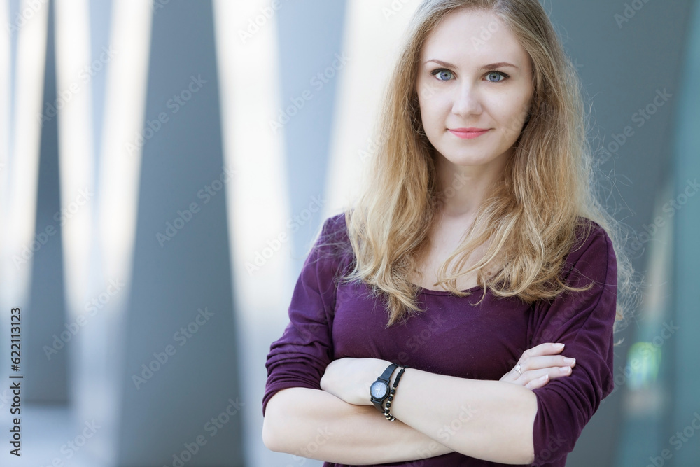 Portrait of an attractive young woman posing outdoors. Portrait of an attractive young woman posing outdoors.