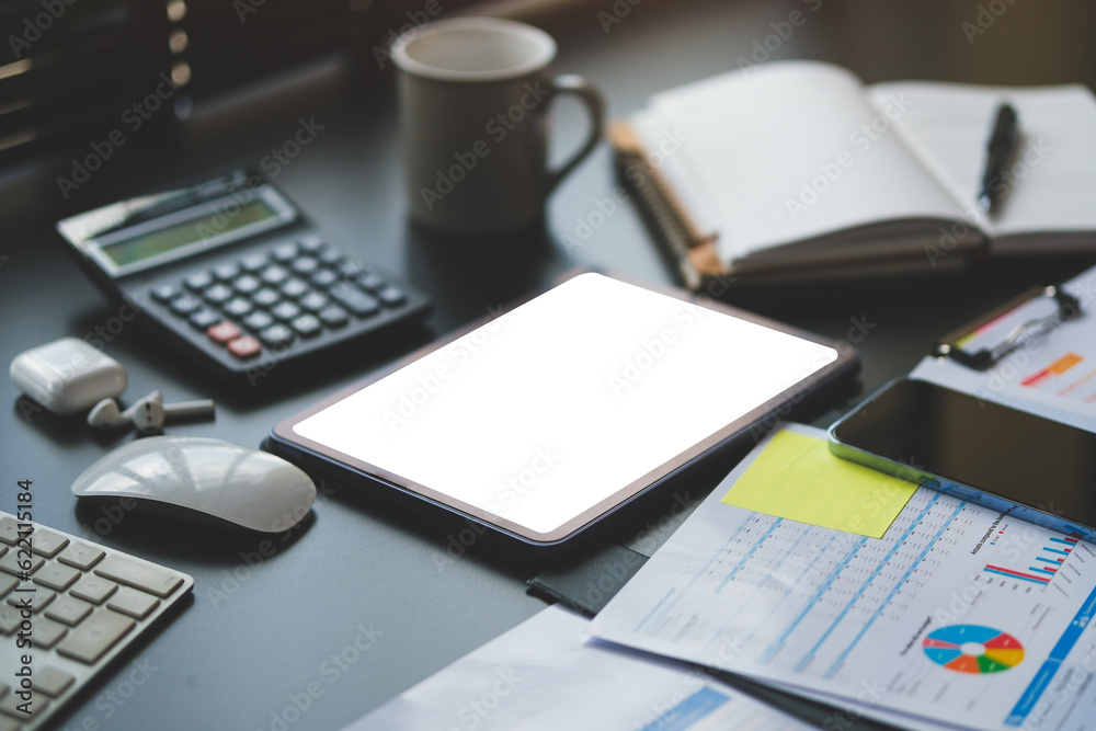 Business graphs, charts, digital tablet and calculator on office desk. Financial development, banking account and statistics. Business graphs, charts, digital tablet and calculator on office desk. Financial development, banking account and statistics.