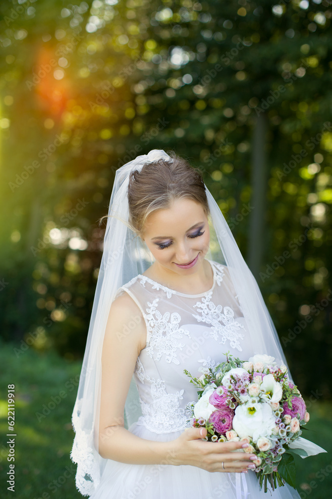 Close up of big bunch of fresh white roses and tulips flowers in female hands. Close up of big bunch of fresh white roses and tulips flowers in female hands.