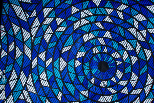 top view of blue and white ankara fabric, flatlay of nigerian wax cloth, rumpled blue and white ankara material	
